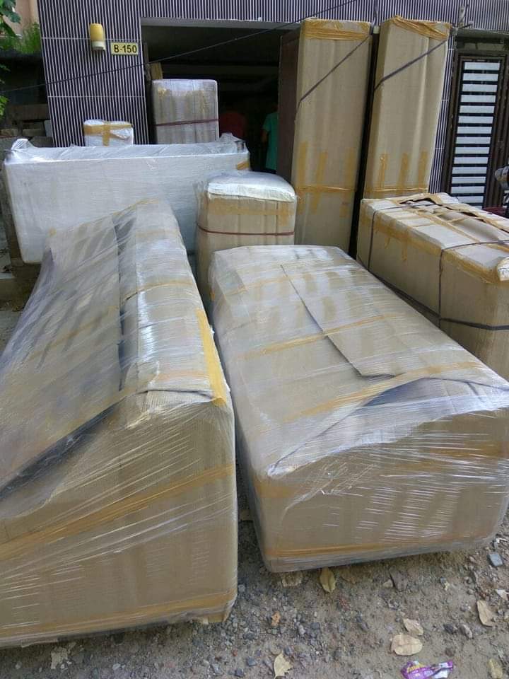 Professional sofa packing using stretch film and corrugated wrap
